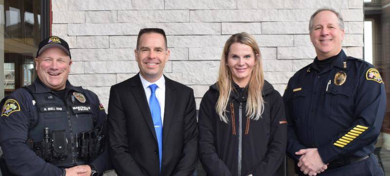 Right to left: Police Chief Rick Smith, embedded social worker Rochelle Long, Mayor Jon Nehring and officer Mike Buell. (File Photo)