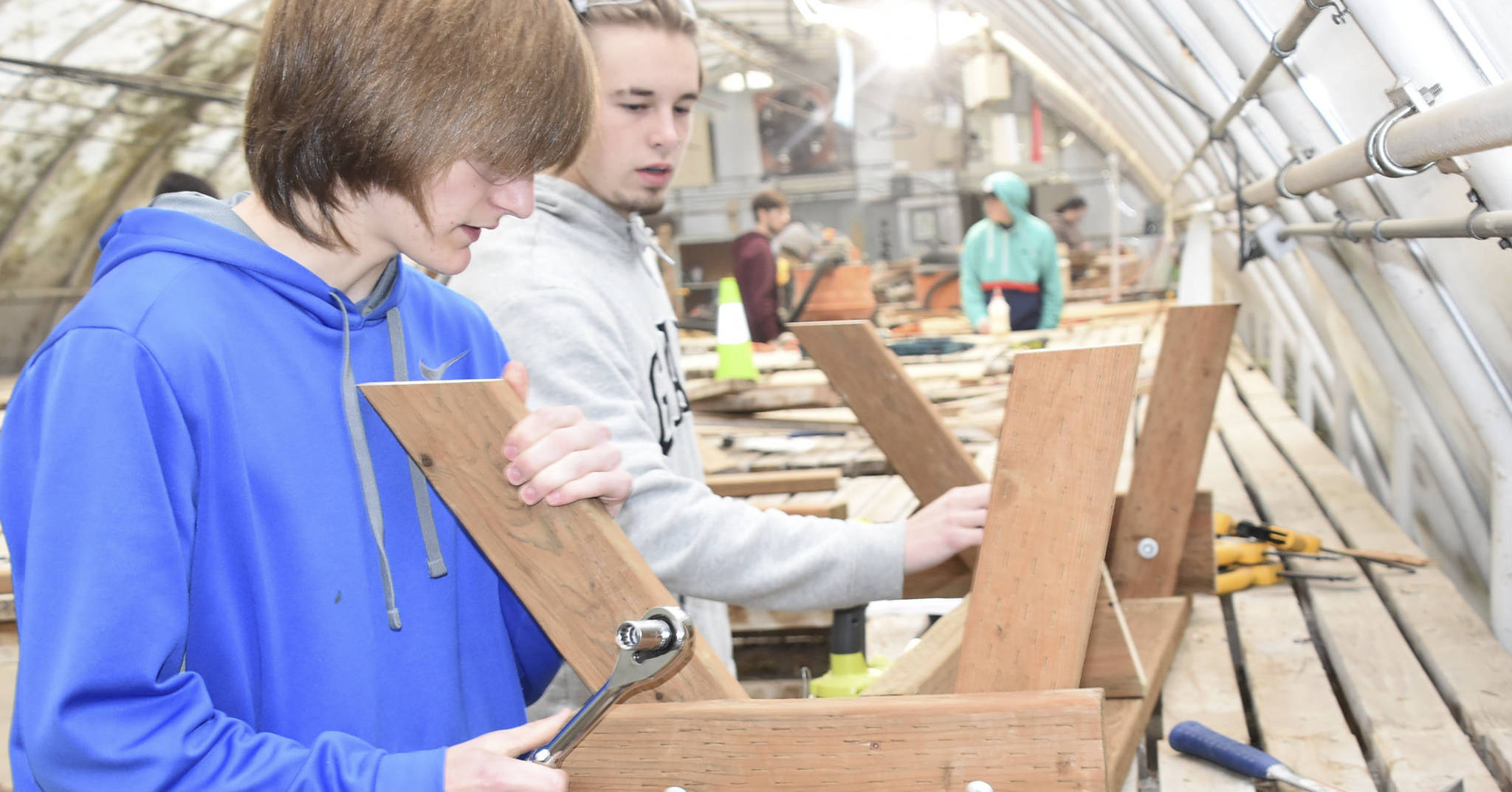 Arlington students Shawn McKinley and Brock Schamp build a bench during their Regional Apprenticeship Pathways (RAP) class.