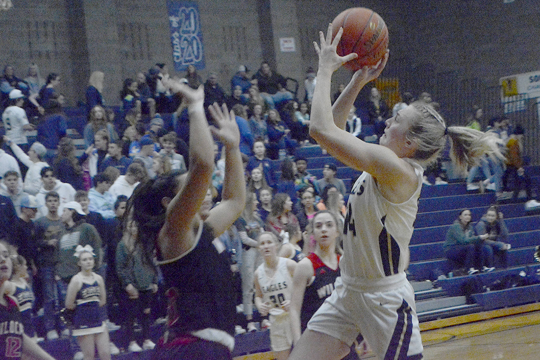 Kierra Marsh drives in for two of her 29 points against ABM.