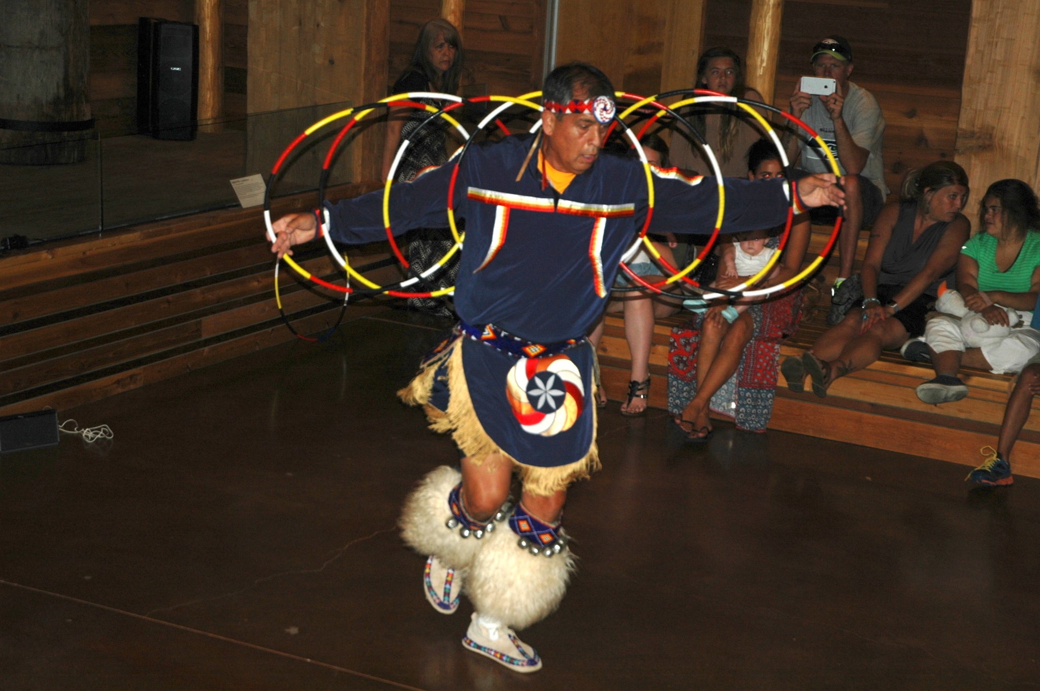 Kirk Boxleitner/Staff PhotoTerry Goedel performs a Native American hoop dance at the Hibulb Cultural Center Aug. 20.