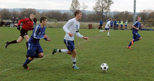 Grace Academy’s Joshua Lee moves the ball upfield during the Oct. 25 match against Mt. Vernon Christian.