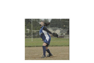 Stilly Valley Crusader Courtney Crossfield pitches against Snohomish County Express 95. Crossfield’s team